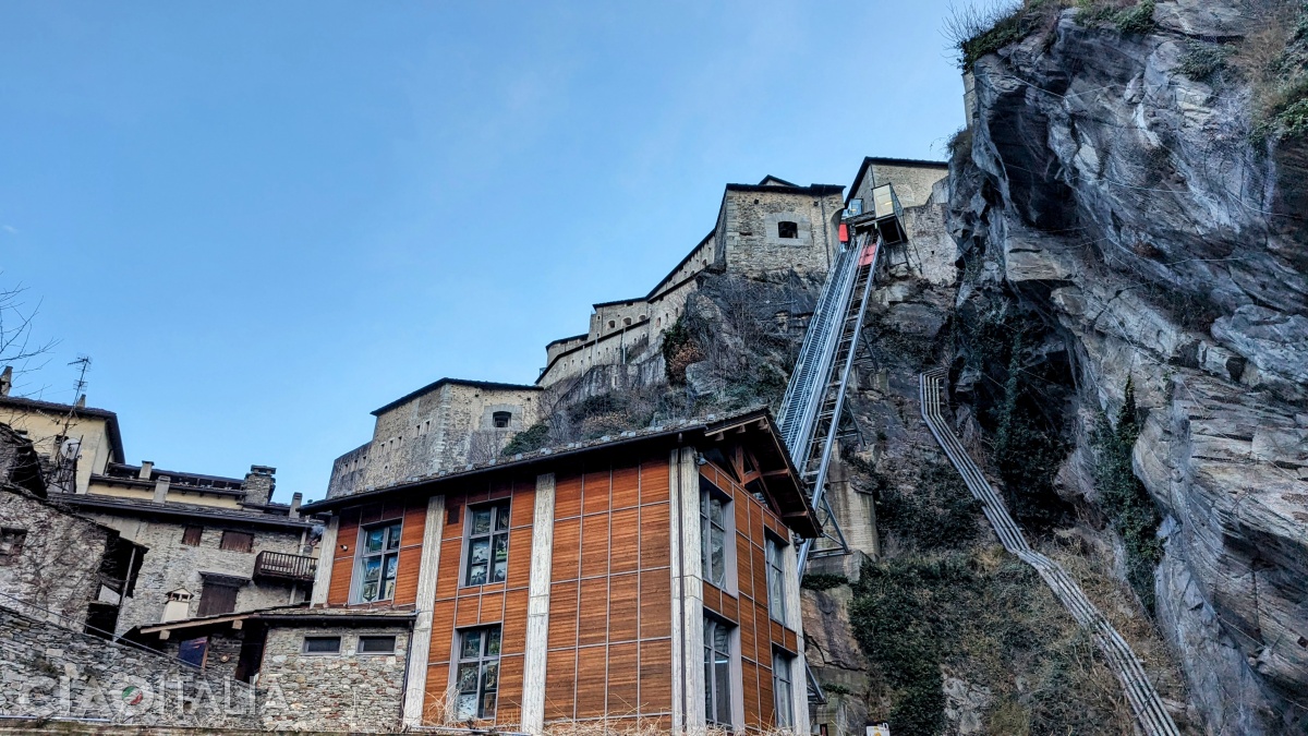 Access to the fortress is provided by a system of glass elevators.