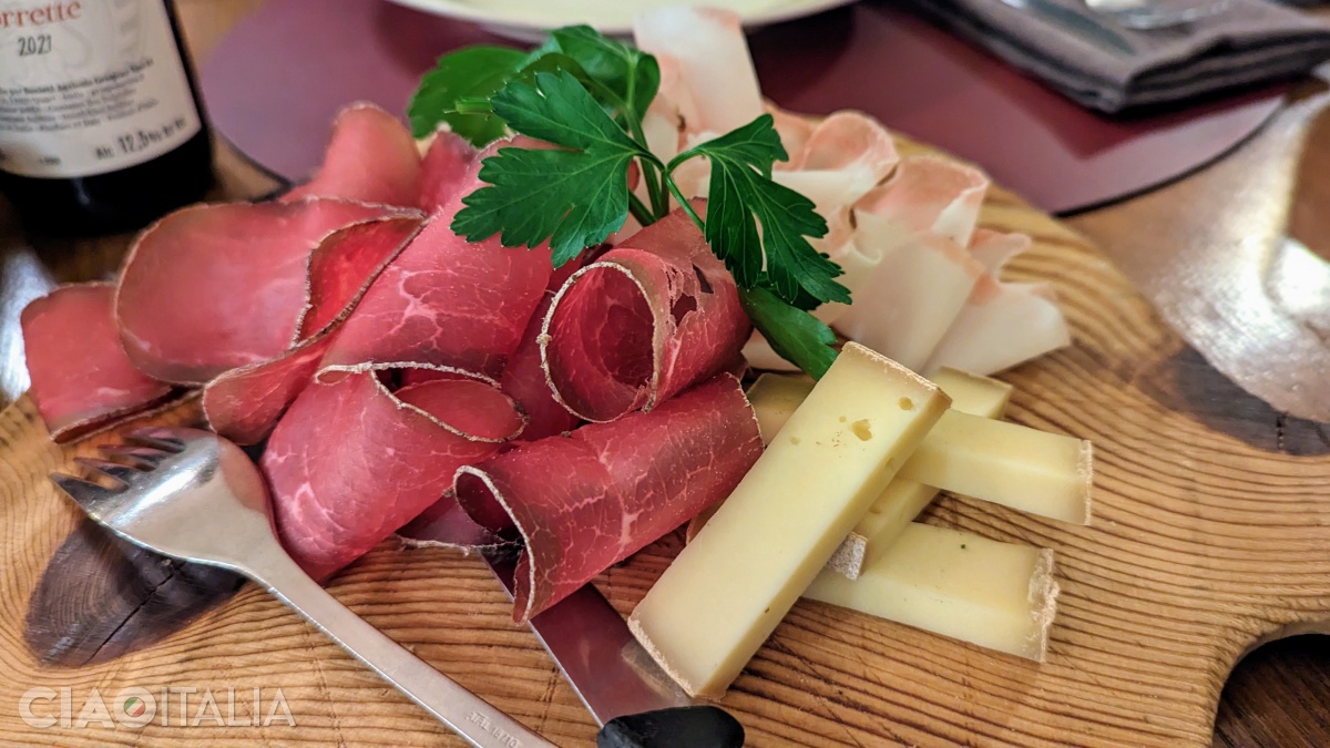 Platter of local products: fontina, mocetta, and lardo di Arnad