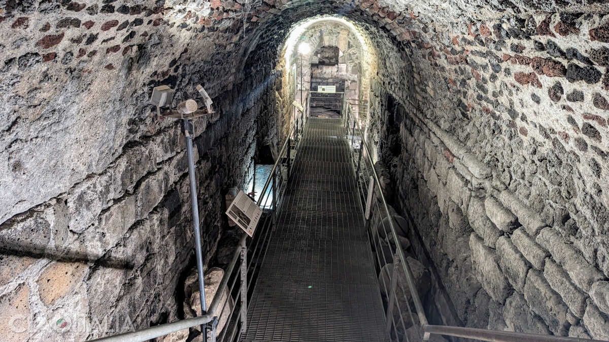 After descending the stairs, you will pass through a corridor.