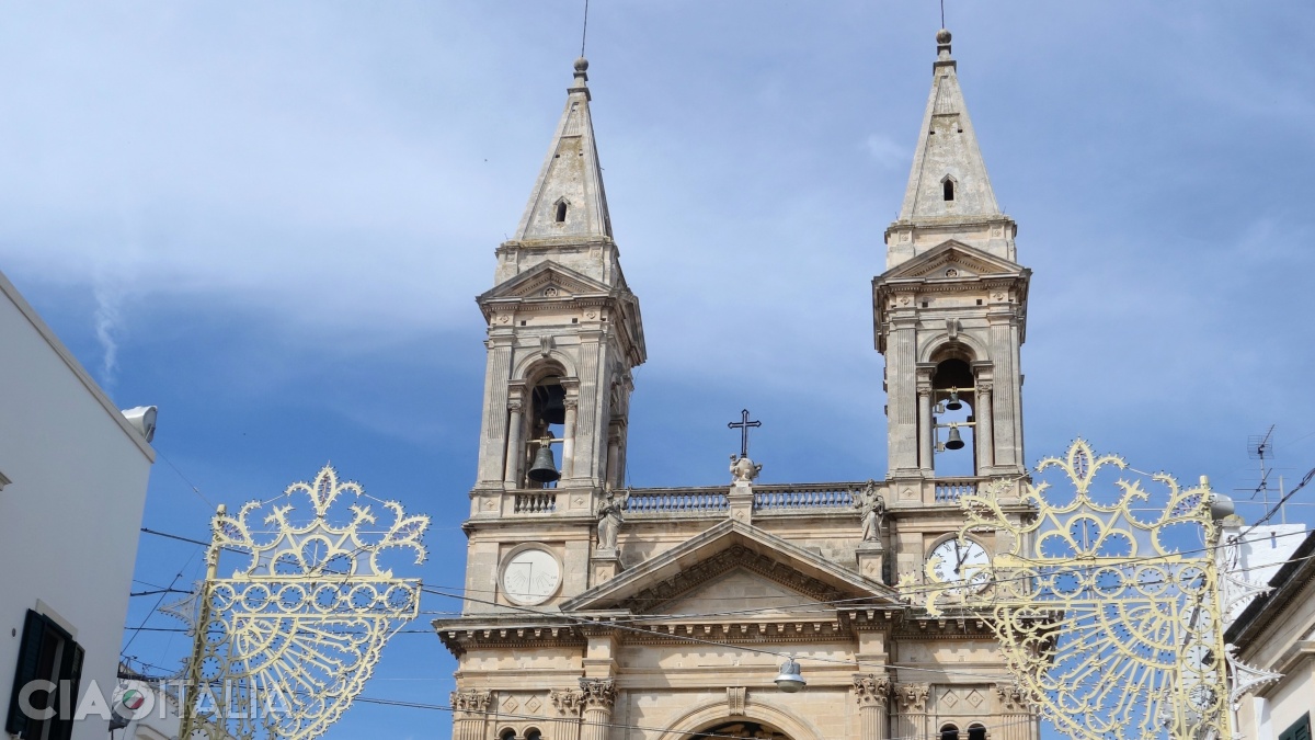 The basilica is dedicated to Saints Cosmas and Damian, the patron saints of Alberobello.