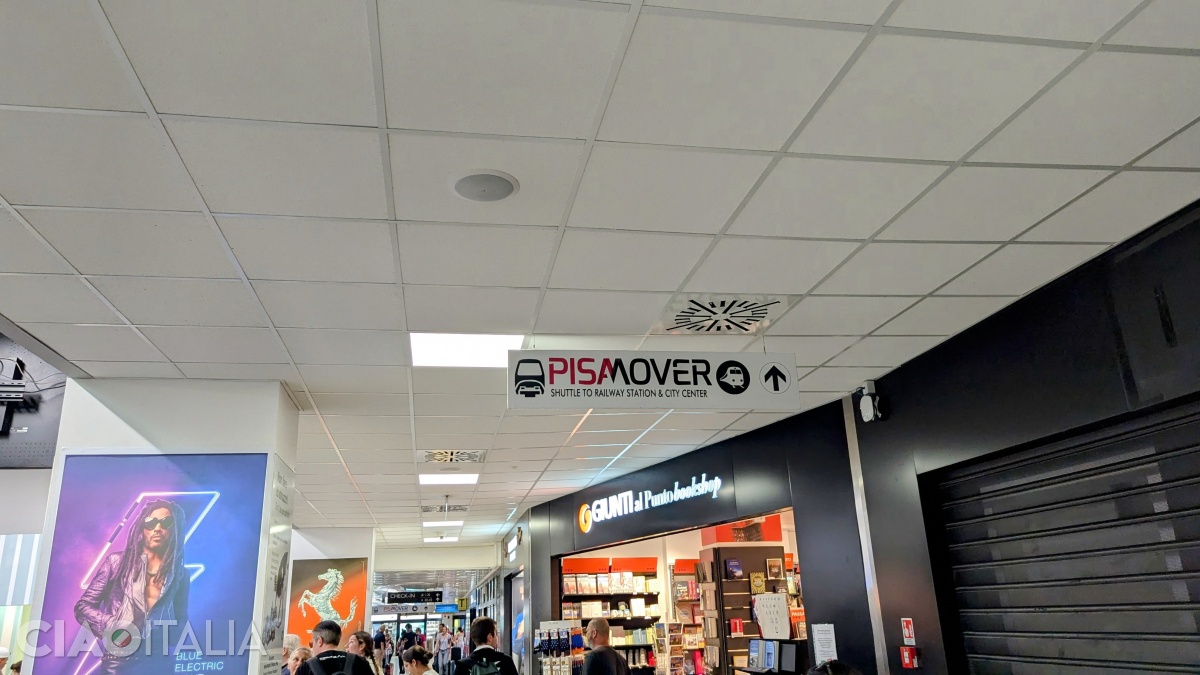 In the airport and outside it, you will find directional signs pointing to the Pisa Mover.