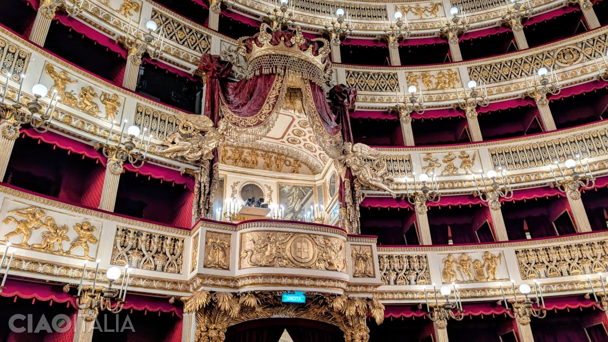 The royal box is sumptuously decorated.