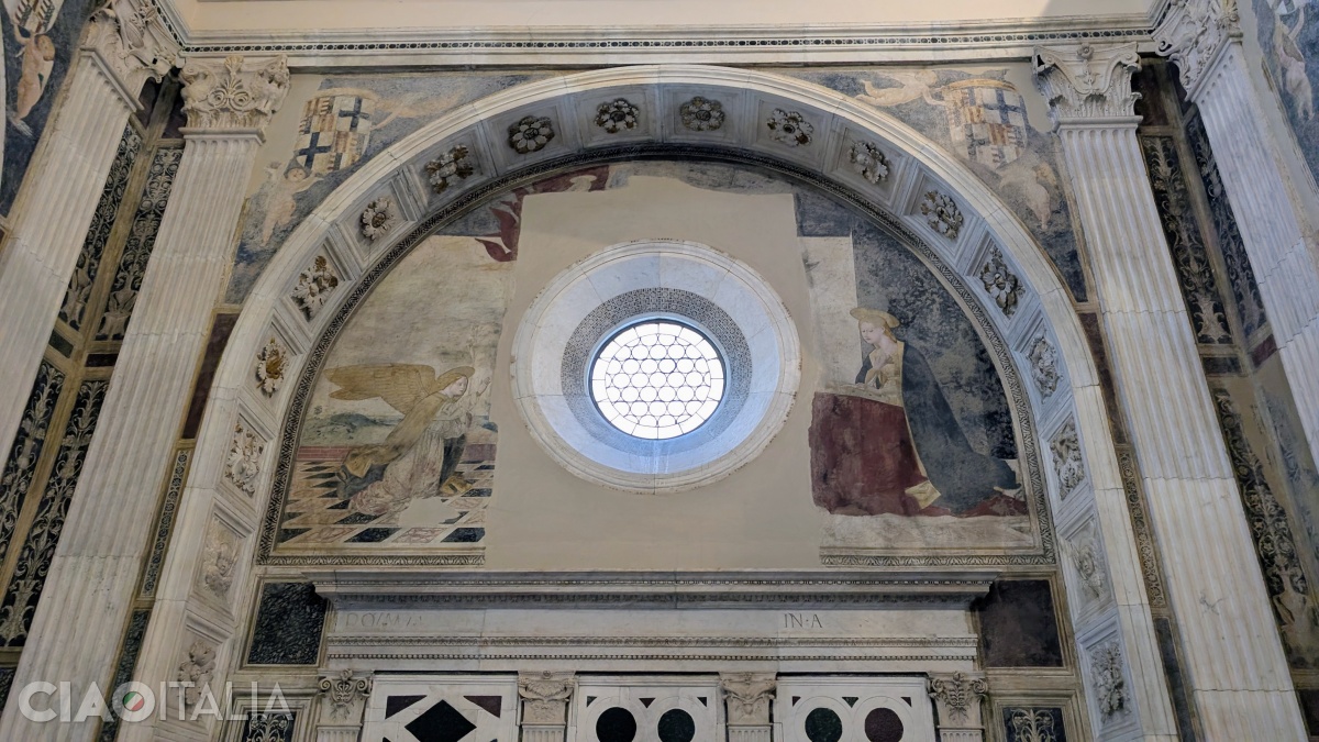 The Annunciation fresco is on the right wall of the chapel.