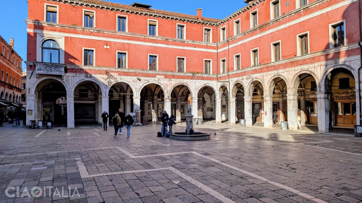 The buildings surrounding the market are known as the "Fabbriche Vecchie".