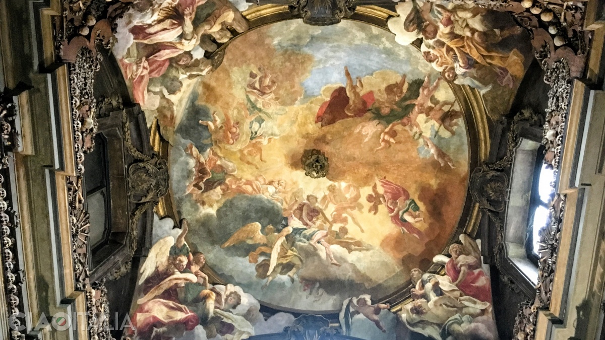 The vault of the ossuary is decorated with 17th century frescoes by Sebastiano Ricci.