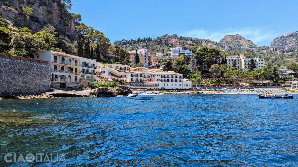 To the left is the luxurious Villa Sant'Andrea, A Belmond Hotel.