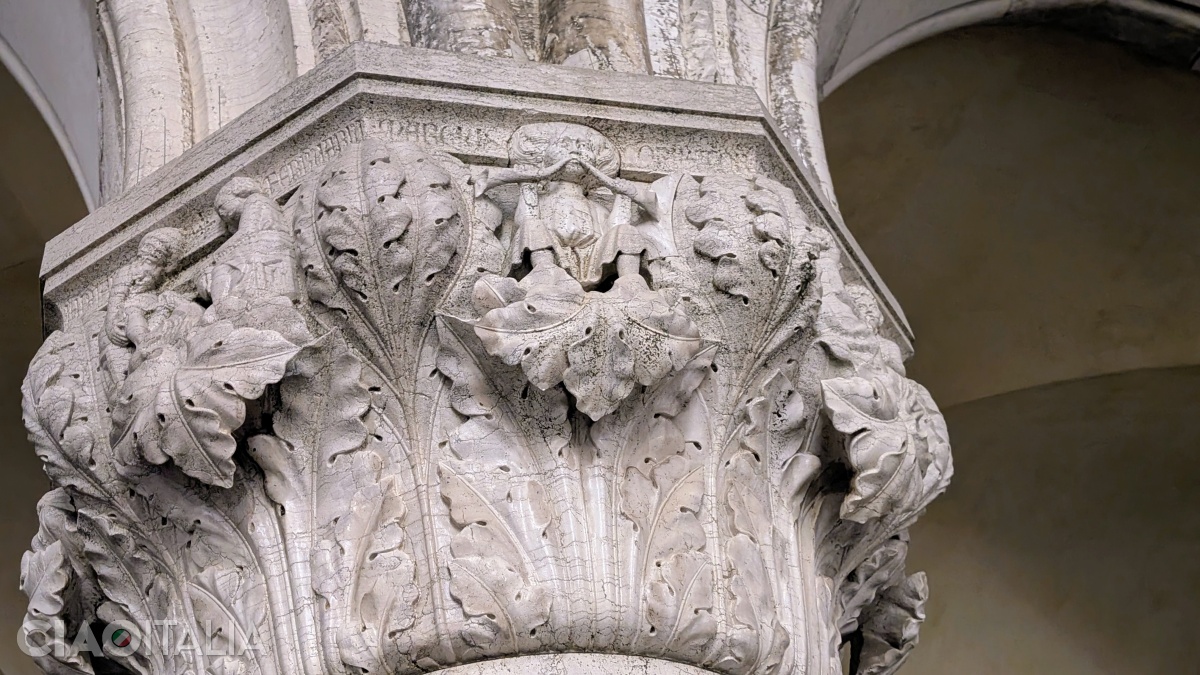 The month of March is symbolized by a man blowing two horns.