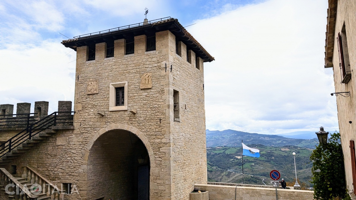 On the other side of the gate, there are two coats of arms carved in stone.