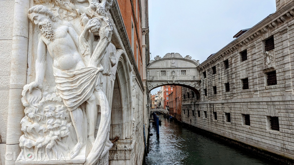 The bas-relief on the side facing the Bridge of Sighs depicts the "Drunkenness of Noah".