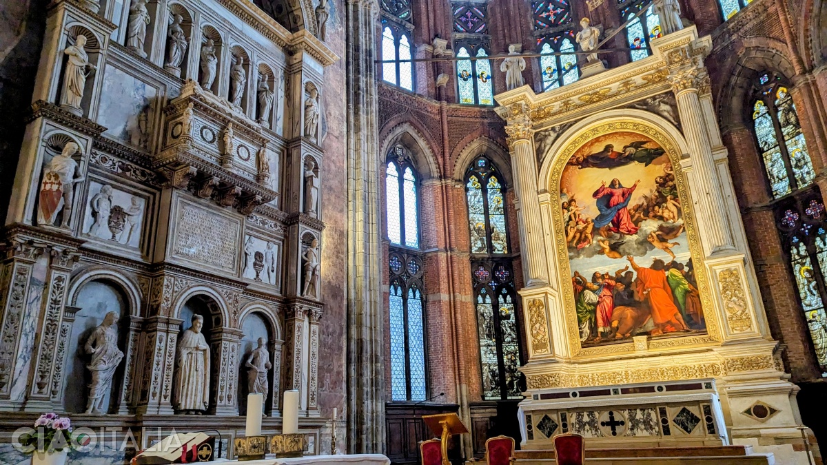To the left of Titian's work is the funerary monument of Doge Niccolò Tron.