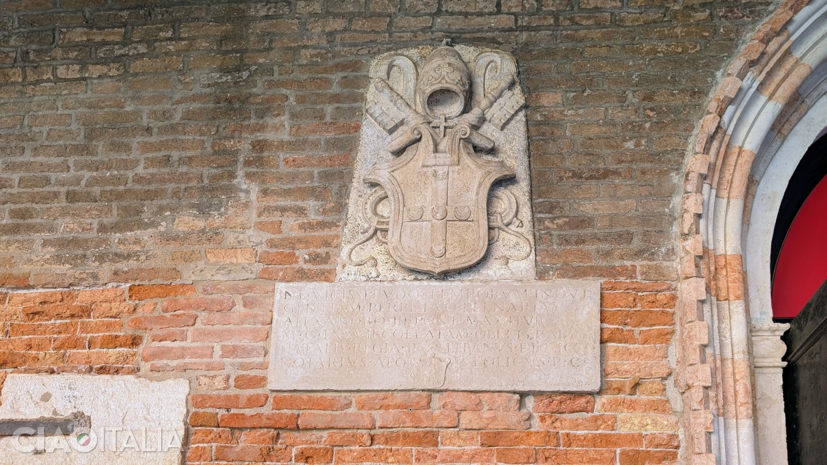 The plaque to the left of the entrance indicates its construction date.