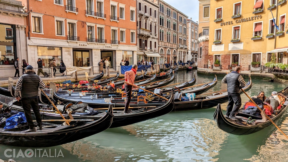The gondoliers wait for their tourists.