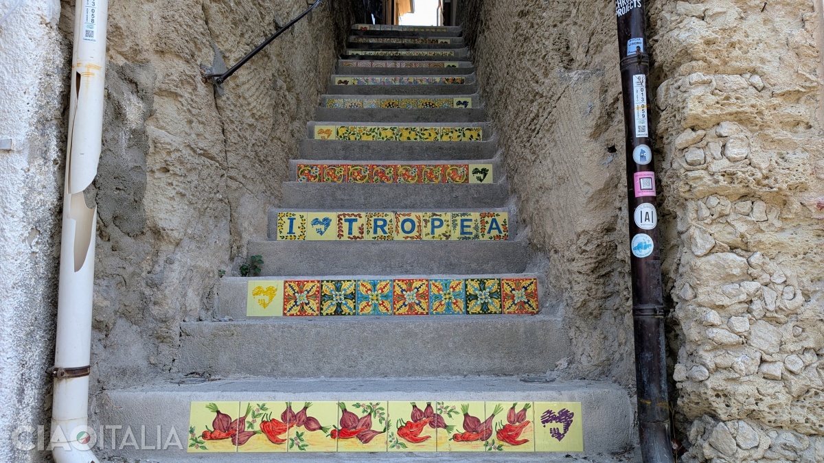 The staircase decorated with ceramic tiles