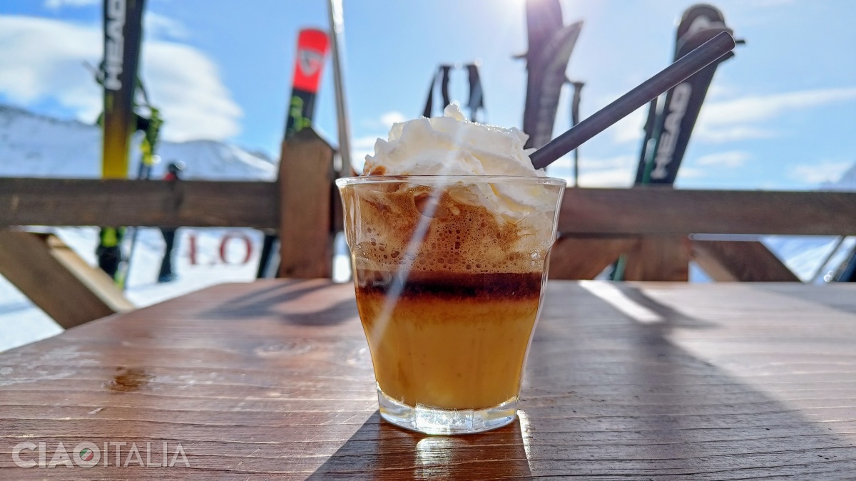 A Calimero (Bombardino liqueur - egg, coffee, and whipped cream) on the slope
